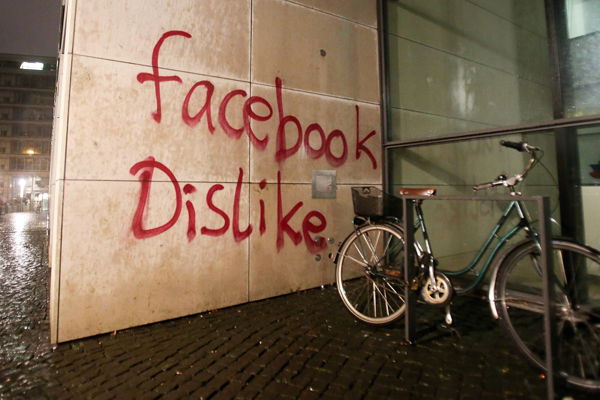 Unknown assailants deface the facade of a building housing the offices of Facebook Germany in Hamburg.