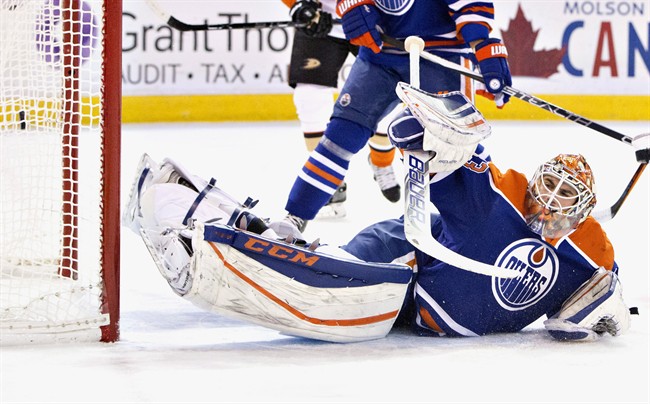 Anaheim Ducks score a goal on Edmonton Oilers goalie Cam Talbot (33) during first period NHL action in Edmonton, Alta., on Thursday December 31, 2015.