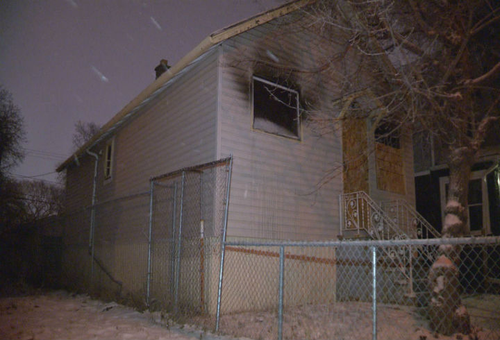 The front and back of a vacant house appear burned after a fire in North Central Regina on Dec. 22.