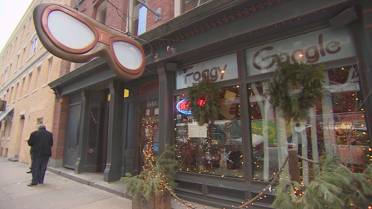 The Foggy Goggle is pictured here with festive planters and a sandwich board outside. The city has given notice that the outside decorations must be removed.