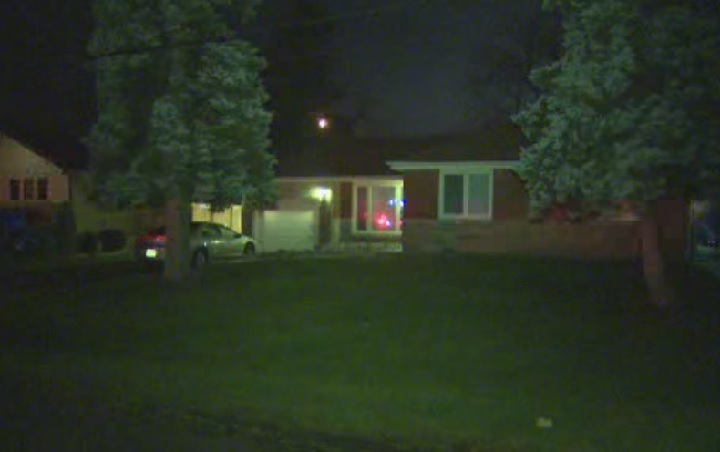 Police investigate a suspected home invasion in Ancaster, Ont. on Dec. 22, 2015.