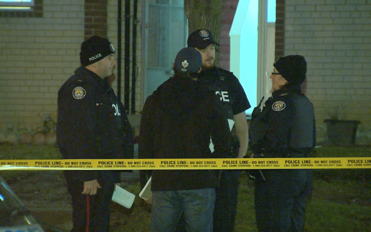 Police investigate a double shooting in Etobicoke on Dec. 13, 2015.