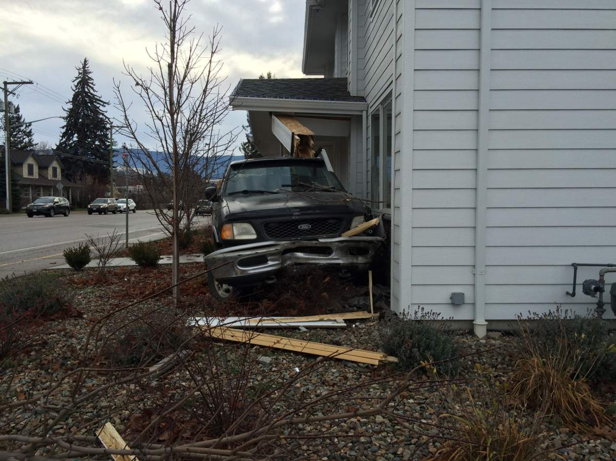 Vernon driver smashes pickup truck into office building - image