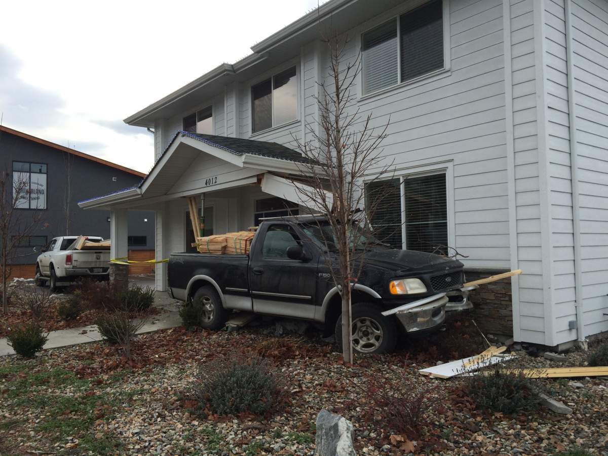 Vernon driver smashes pickup truck into office building - image