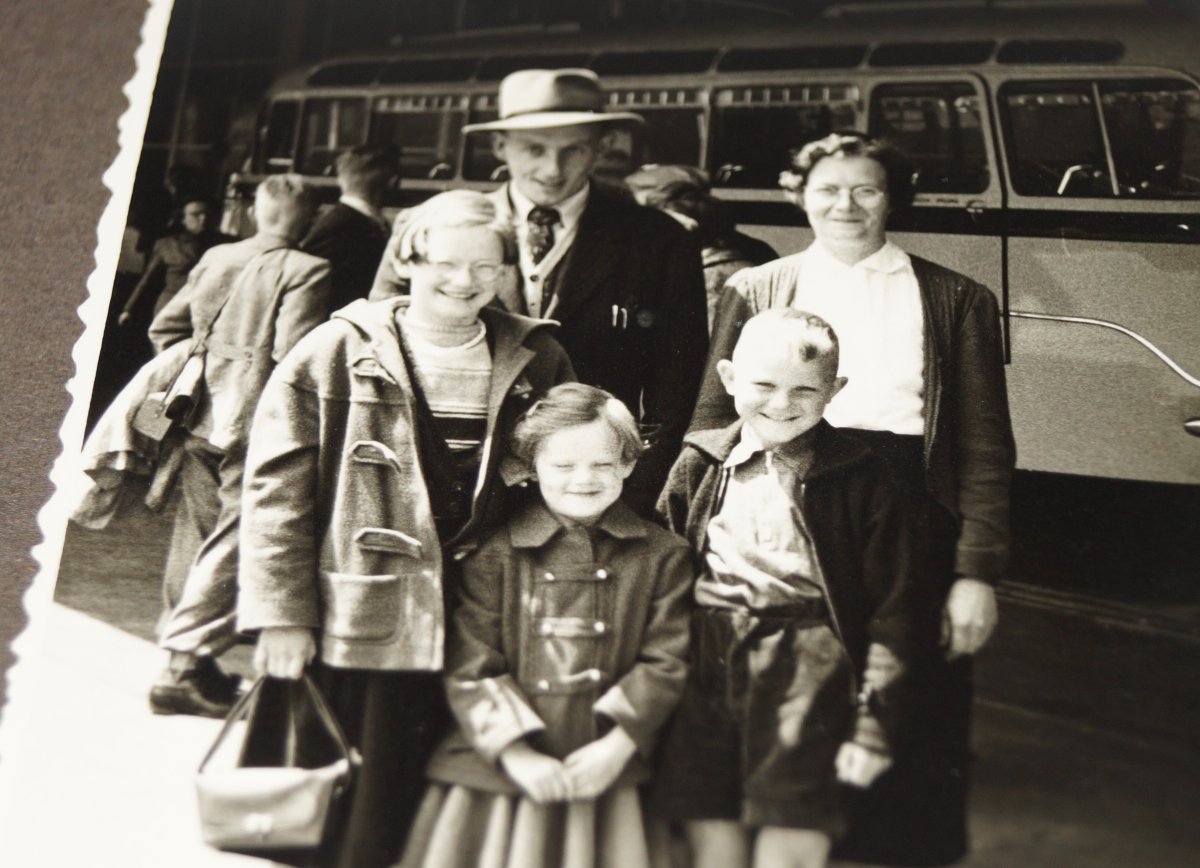 In June 1954, Bert Siegers, right, his parents Marten and Henke, and sisters Tieke and Betty prepare to board the bus that will take them to Rotterdam for their voyage to Canada.