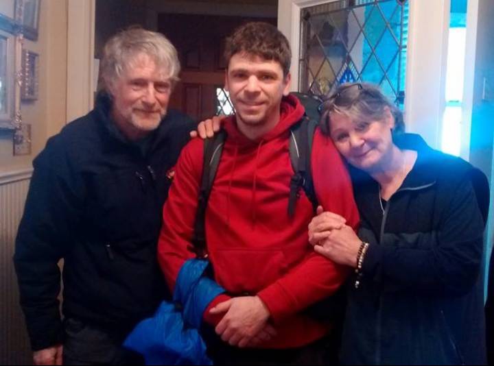 Jason de Belle with his mother, Debi Oswald, and father, Phil de Belle.