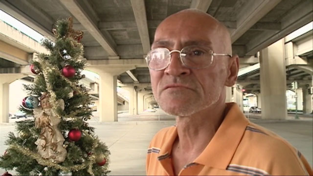Homeless man gets Christmas tree back thanks to kind strangers after city deems it a ‘violation’ - image