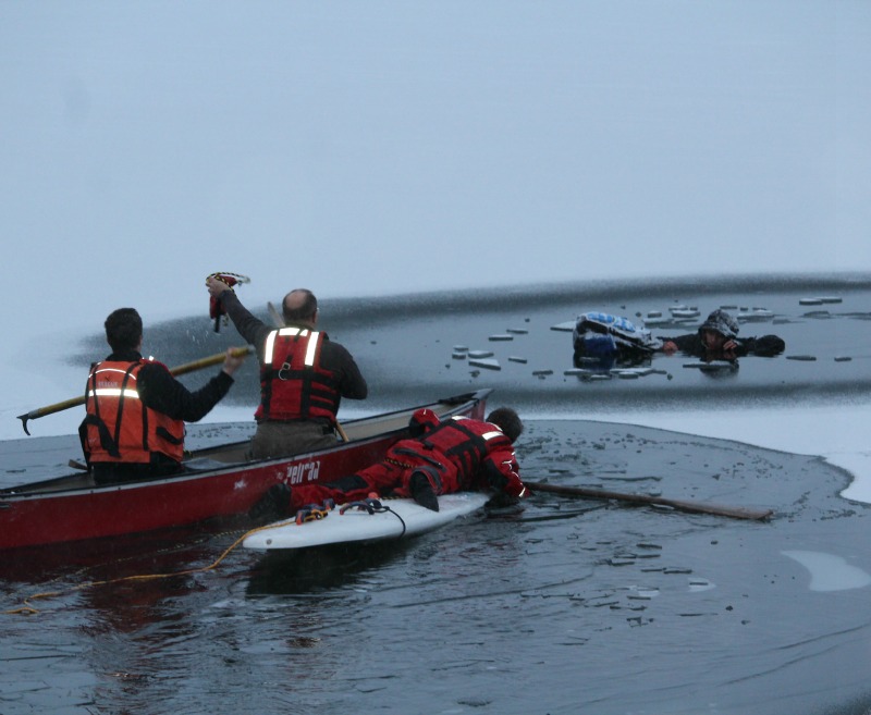 Young man holds on for dear life after falling through ice in Oliver - image
