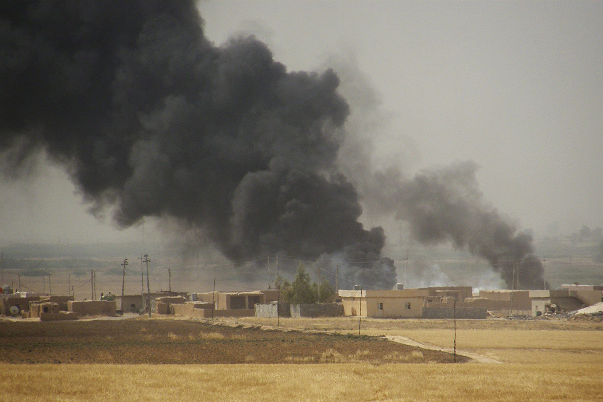  In this Wednesday, Sept. 30, 2015 file photo, smoke rises during a military operation launched by Kurdish troops known as peshmerga to regain control of some villages from the Islamic State group, in the oil-rich city of Kirkuk, 180 miles (290 kilometers) north of Baghdad, Iraq. 