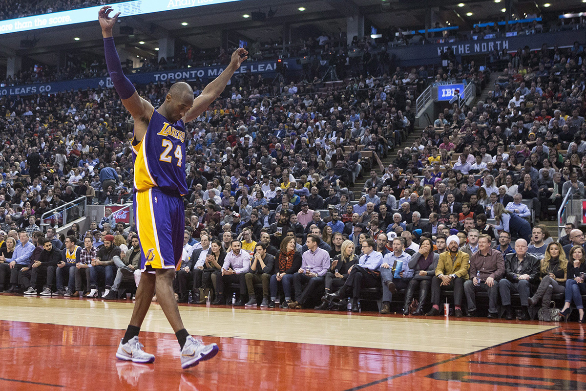 Los Angeles Lakers's Kobe Bryant stretches out as he returns to the court during the second half of the Lakers 102-93 loss to the Toronto Raptors in NBA basketball action in Toronto on Monday, December 7, 2015.