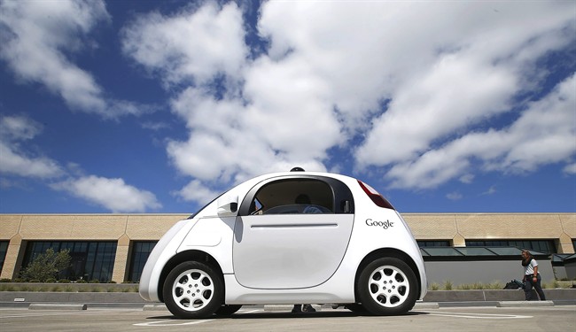 In this May 13, 2015, file photo, Google's new self-driving prototype car is presented during a demonstration at the Google campus in Mountain View, Calif.