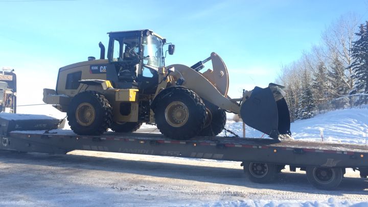Several bullet holes can be seen on a front-end loader police say was used in a rampage in Red Deer on Christmas Day.