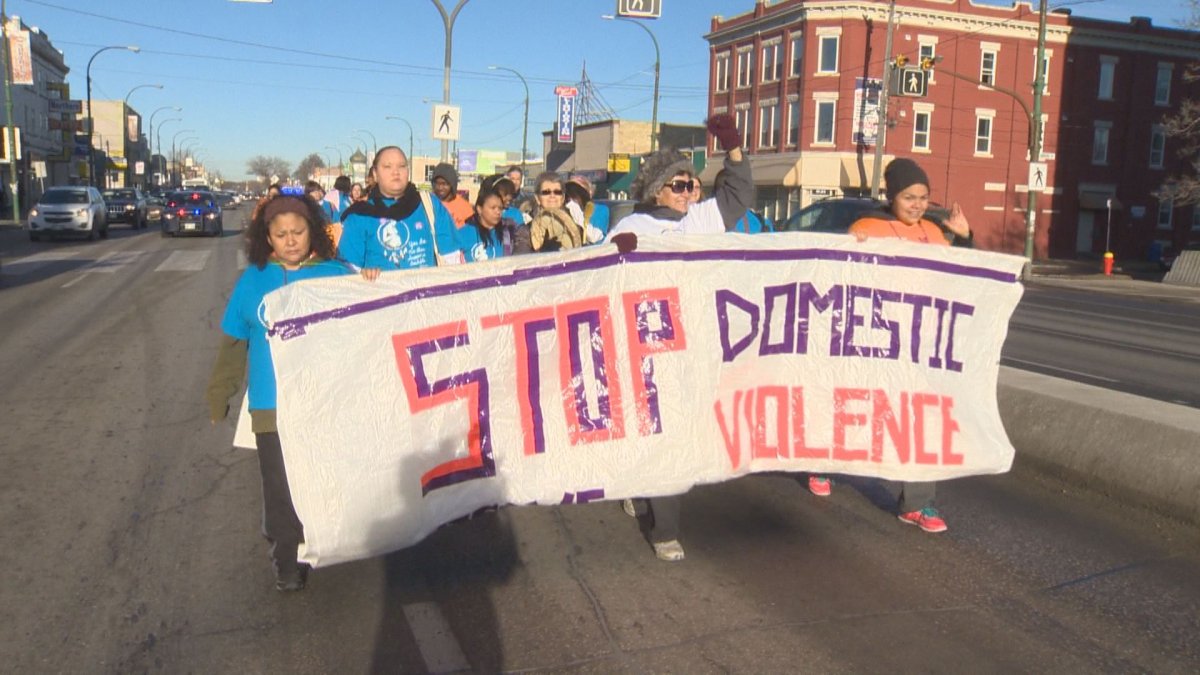 March against domestic violence winds down Main Street - image