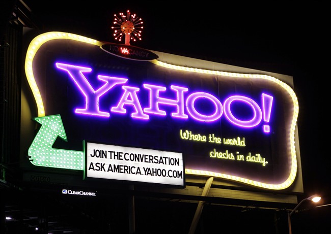 In this Oct. 4, 2010 file photo, a Yahoo signboard is displayed in San Francisco. Shares of Yahoo are up sharply before the opening bell, Wednesday, Dec. 2, 2015, on a report that the company will discuss the sale of its Internet business. (AP Photo/Paul Sakuma).