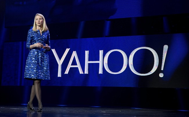 FILE - In this Jan. 7, 2014, file photo, Yahoo president and CEO Marissa Mayer speaks during the International Consumer Electronics Show in Las Vegas. Yahoo announced Wednesday, Dec. 9, 2015, it is scrapping its original plan to spin off its prized stake in China’s Alibaba Group and will instead break off the rest of its business into a new company.
