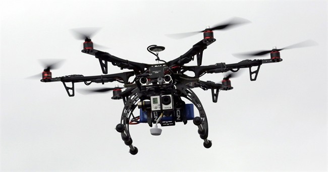 In this Feb. 13, 2014, file photo, a drone is demonstrated in Brigham City, Utah. 
