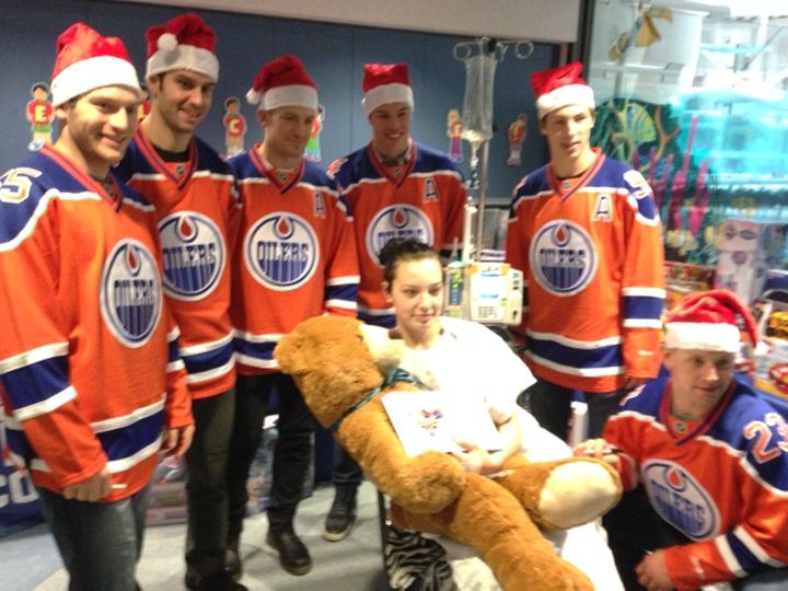 Members of the Edmonton Oilers visit patients at several Edmonton-area hospitals Tuesday, Dec. 8, 2015.