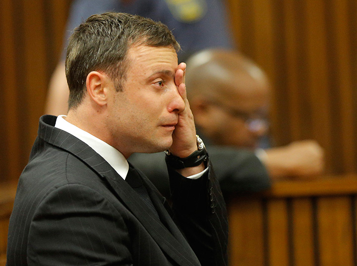 Oscar Pistorius reacts during the verdict in his September 11, 2014murder trial in Pretoria, South Africa. 