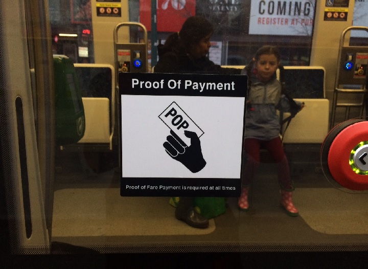 Proof-of-payment sticker on a TTC streetcar on Dec. 14, 2015.