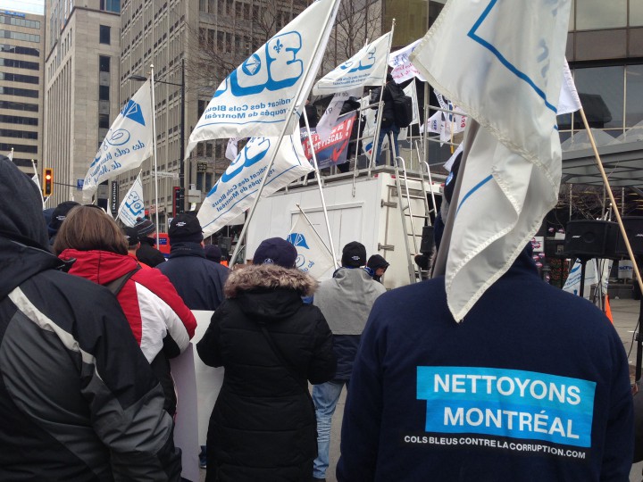Blue collar workers protest in downtown Montreal, Monday, December 7, 2015.