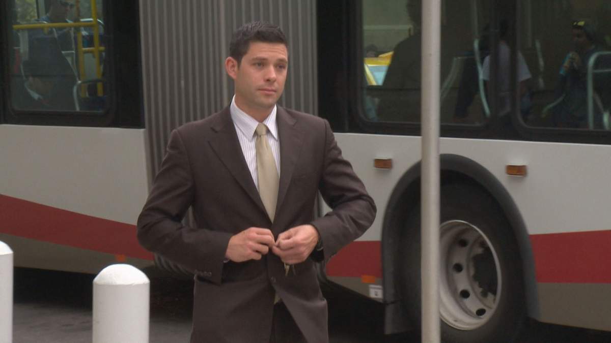 Nicholas Rasberry in front of the Calgary Courts Centre.