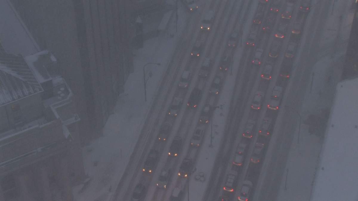 The view from the 30th floor of 201 Portage. Traffic is backed up in all directions in downtown Winnipeg. 