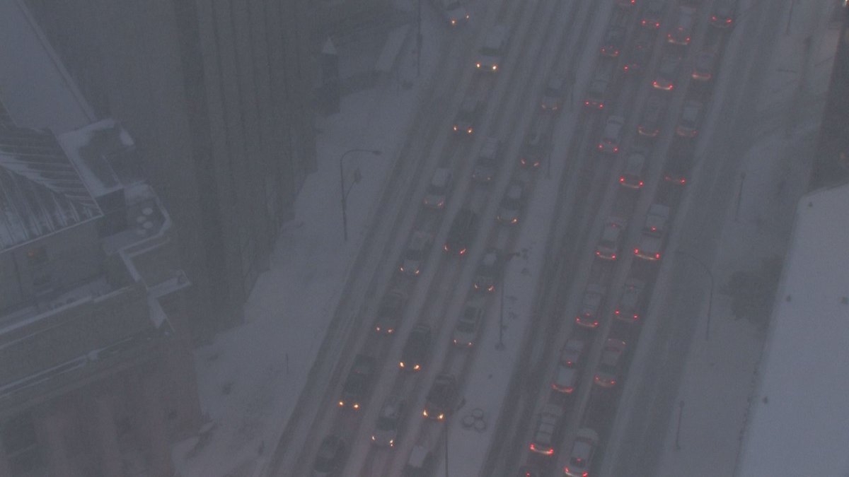 The view from the 30th floor of 201 Portage. Traffic is backed up in all directions in downtown Winnipeg. 