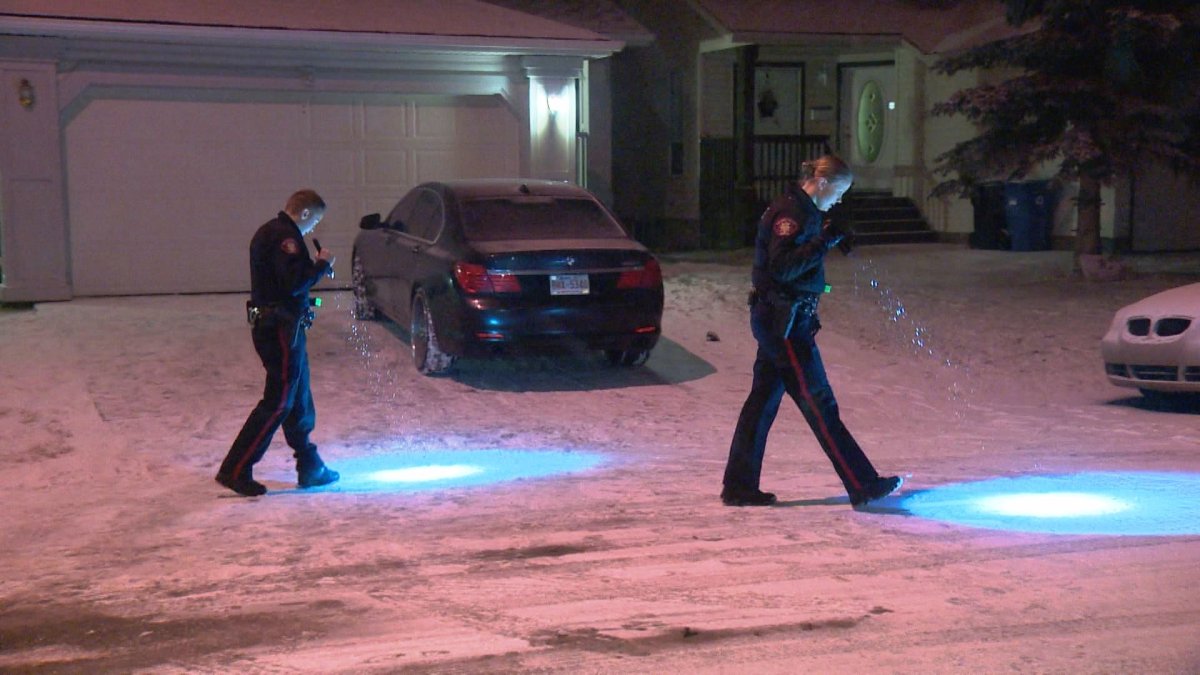 Calgary police investigate a drive-by shooting on Coral Springs Place N.E. on Sunday, Dec. 13, 2015 .
