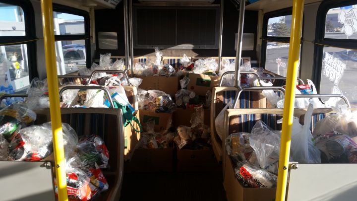 Food donations piled into a Lethbridge Transit bus for annual food bank Stuff-A-Bus campaign. 