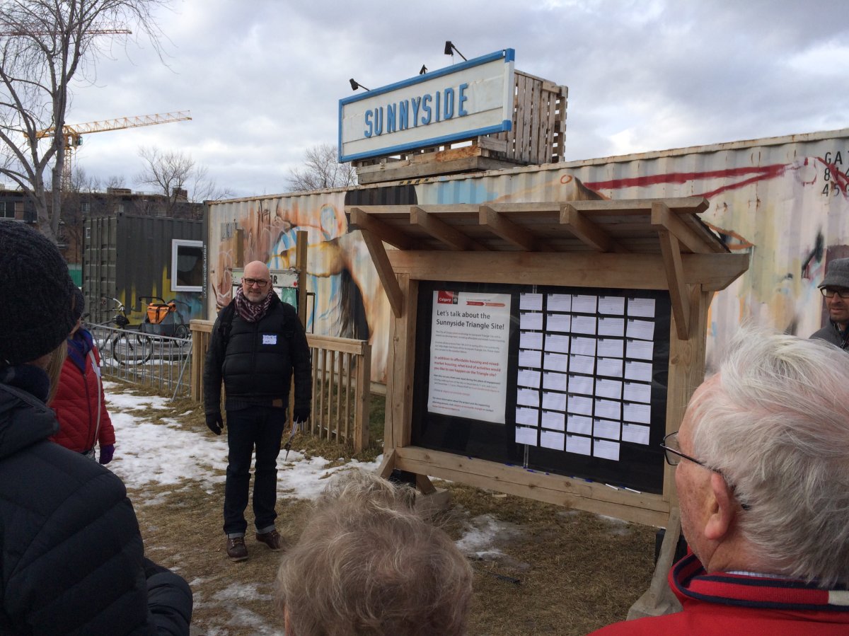 Calgarians take part in a walking tour of the Sunnyside Triangle on Sunday as the city looks for input on how to redevelop it.