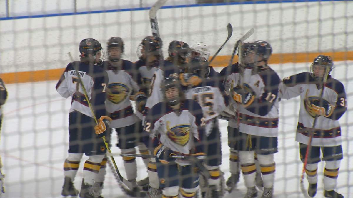 The AAA Midget Winnipeg Thrashers celebrate after a 7-1 victory over the Southwest Cougars on Sunday at the Gateway Arena.
