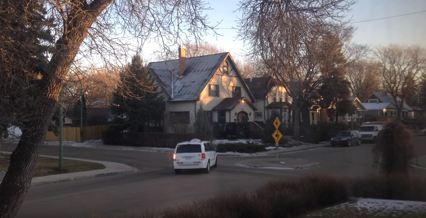 A van is seeing turning left incorrectly through the traffic circle at Robinson Street and 20th Avenue in a viral YouTube video posted on Tuesday.