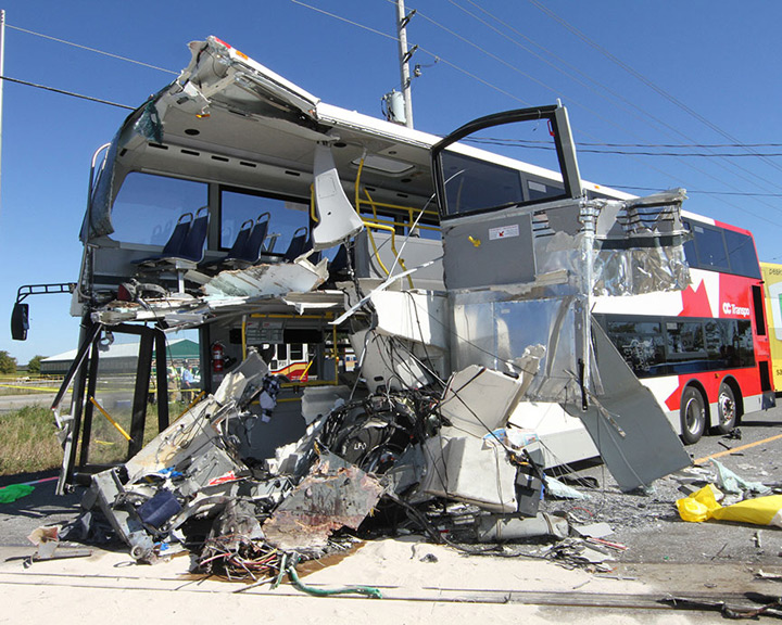 Photo of a damaged OC Transpo bus following a train crash