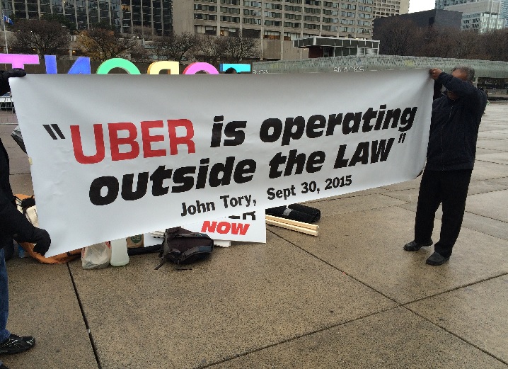 Members of Toronto's taxi industry stage a hunger strike outside City Hall to protest Uber operations on Dec. 1, 2015.