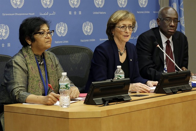 Canadian judge Marie Deschamps, center, chair of the Independent Review Panel on UN Response to Allegations of Sexual Abuse by Foreign Military Forces in the Central African Republic, is flanked by panel members Yasmin Sooka, left, and Hassan Jallow, at a news conference at the United Nations, Thursday, Dec. 17, 2015. The United Nations' "gross institutional failure" to act on allegations that French and other peacekeepers sexually abused children in the Central African Republic led to even more assaults, according to a new report released Thursday. (AP Photo/Richard Drew).