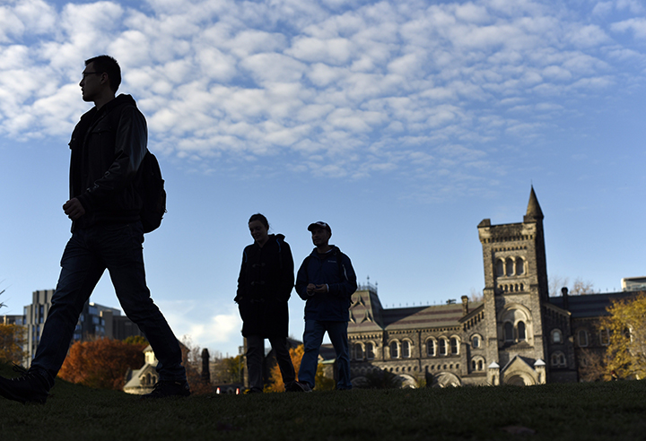 Students cross the front campus at the University of Toronto's downtown campus on Nov 2 2015.
