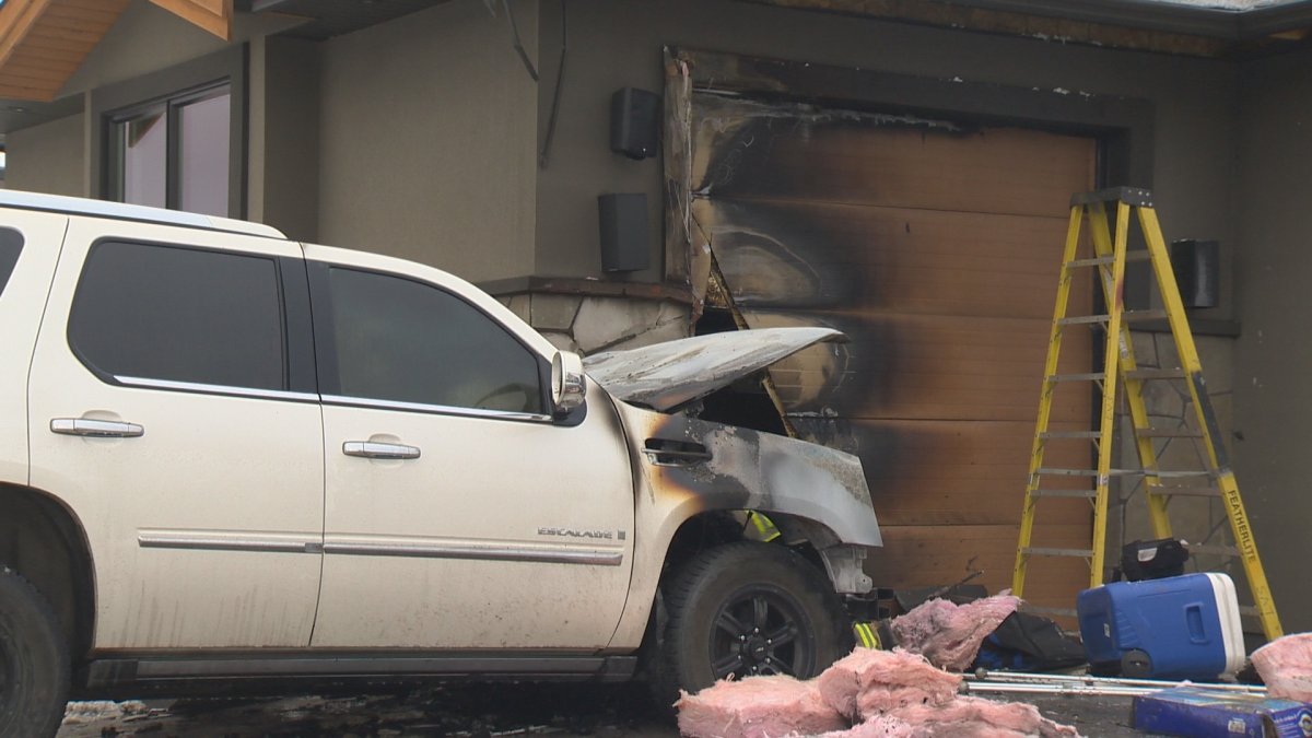 A vehicle fire spread to a home in the 700 block of Kuipers Crescent in Kelowna on Saturday morning. 