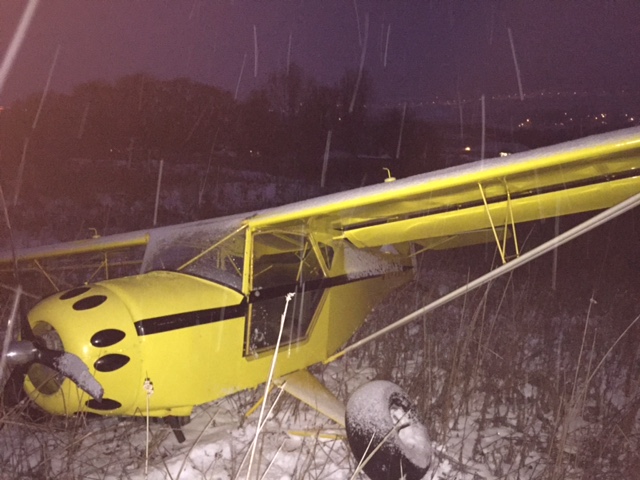 A small two-passenger plane was forced to make an emergency landing near Vernon's airport.