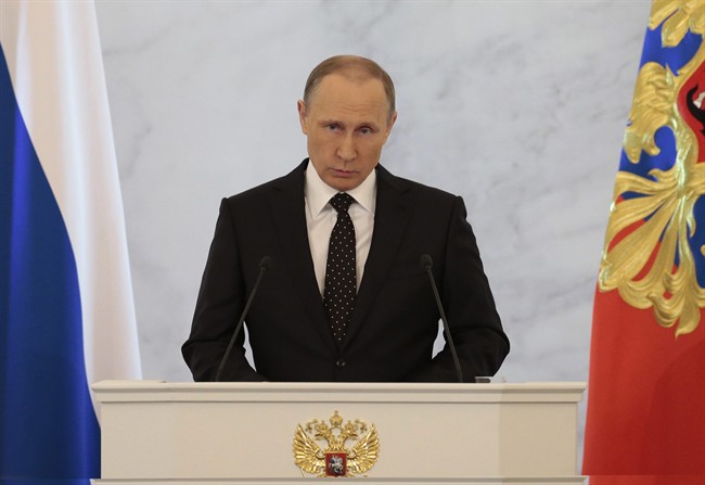 Russian President Vladimir Putin gives his annual state of the nation address in the Kremlin in Moscow, Russia, Thursday, Dec. 3, 2015. (AP Photo/Ivan Sekretarev).