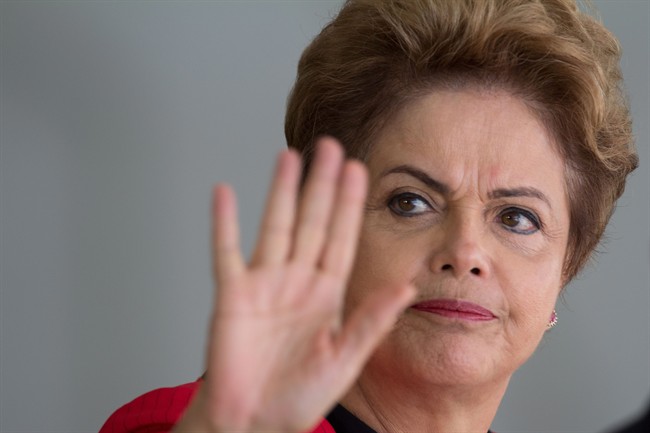In this July 17, 2015 file photo, Brazil's President Dilma Rousseff waves to the press as she arrives to greet leaders arriving for a Mercosur Summit at Itamaraty Palace in Brasilia, Brazil. Impeachment proceedings have been opened on Wednesday, Dec. 2, 2015, against Rousseff.