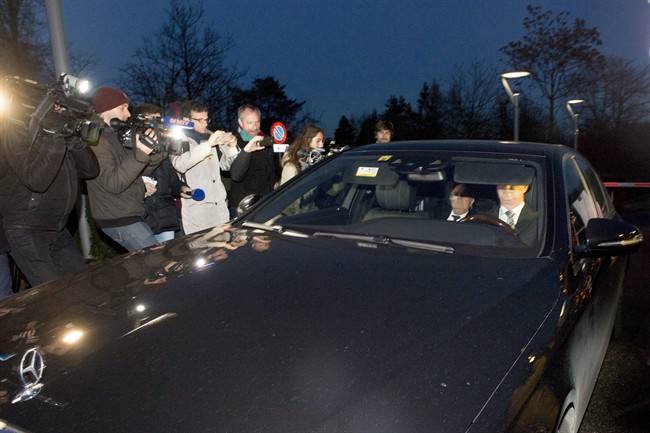 FIFA President Sepp Blatter, left, leaves in a car at the FIFA Headquarters "Home of FIFA" in Zurich, Switzerland, Thursday, Dec. 17, 2015. While FIFA President Sepp Blatter appeared in person on Thursday before the panel of four judges of the FIFA ethics court, UEFA President Michel Platini plans to boycott his hearing on Friday Dec. 18. Blatter and Platini were banned for 90 days for all activities in football.