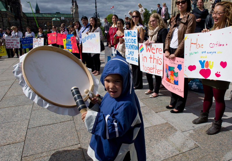 Micheal Sammortuk, 4, of Rankin Inlet joins Inuit youth as they mark world suicide prevention day with a "Celebrate Life" event on Parliament Hill in Ottawa on Monday, September 10, 2012. THE CANADIAN PRESS/Sean Kilpatrick.