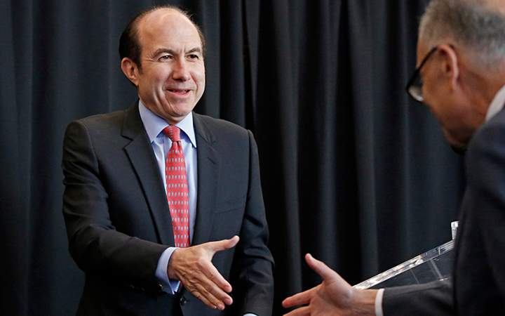 Viacom CEO Philippe Dauman, left, greets Sen. Charles Schumer, D-New York, before Schumer gives an address at Viacom headquarters, in New York. 