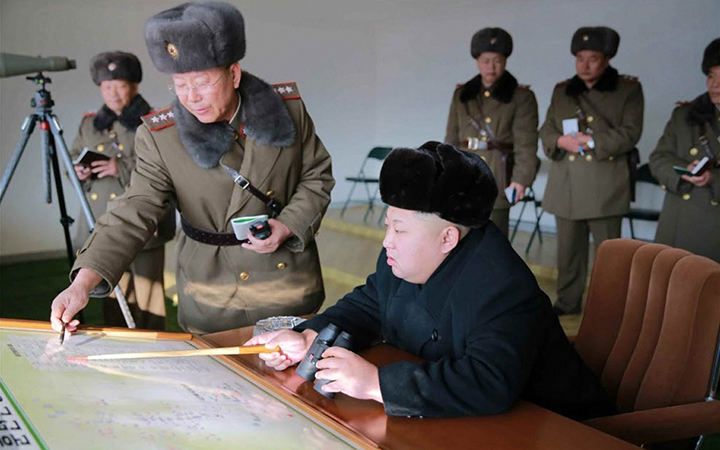 An undated picture released by the Rodong Sinmun, North Korea's ruling Workers' Party newspaper showing North Korean leader Kim Jong-un talking with a senior official of the North Korean People's Army. 