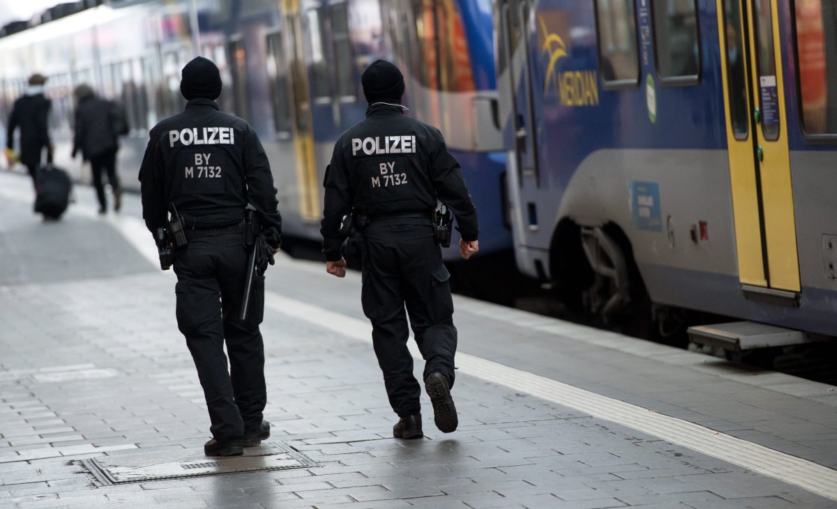 Police patrol at the main railway station in Munich, southern Germany, Saturday, Jan. 2, 2016. Police are maintaining a heightened presence following warnings of a planned attack on New Year's Eve. 