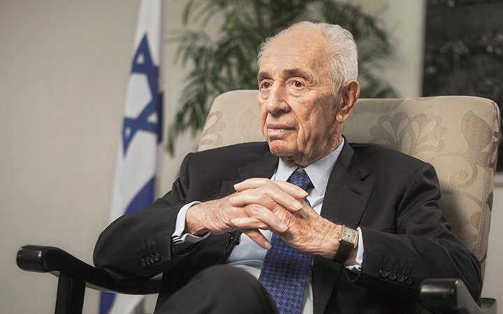 Former Israeli President Shimon Peres speaks during an interview with The Associated Press in Jerusalem. 