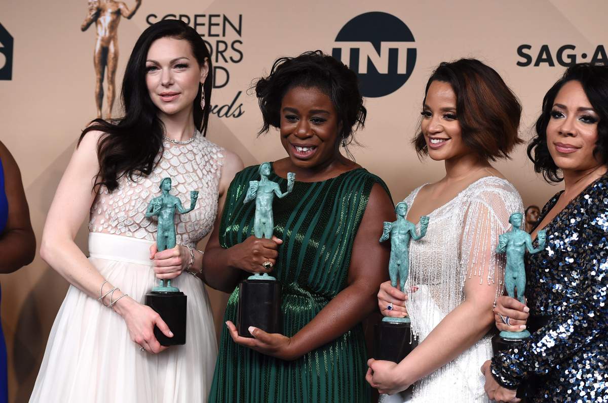 Laura Prepon, from left, Uzo Aduba, Dascha Polanco, and Selenis Leyva pose in the press room with the award for outstanding ensemble in a comedy series at the 22nd annual Screen Actors Guild Awards at the Shrine Auditorium & Expo Hall on Saturday, Jan. 30, 2016, in Los Angeles. ()
