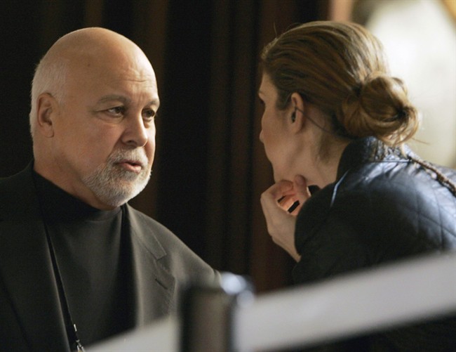 Celine Dion talks with her husband René Angélil during a break in her rehearsal at the Kodak Theatre Friday, Feb. 23, 2007, in Los Angeles.