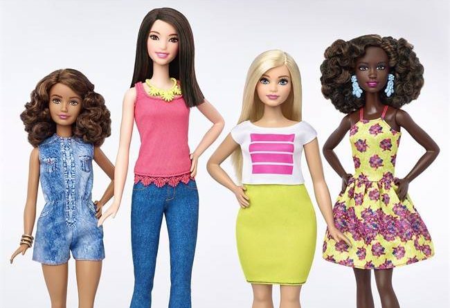 This photo provided by Mattel shows a group of new Barbie dolls introduced in January 2016.
