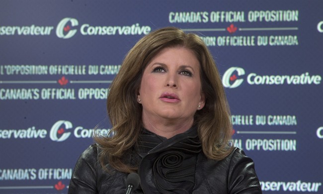 Opposition leader Rona Ambrose responds to a question as she speaks during a news conference in Ottawa, Monday, January 25, 2016. She will give a speech in Halifax on Saturday.